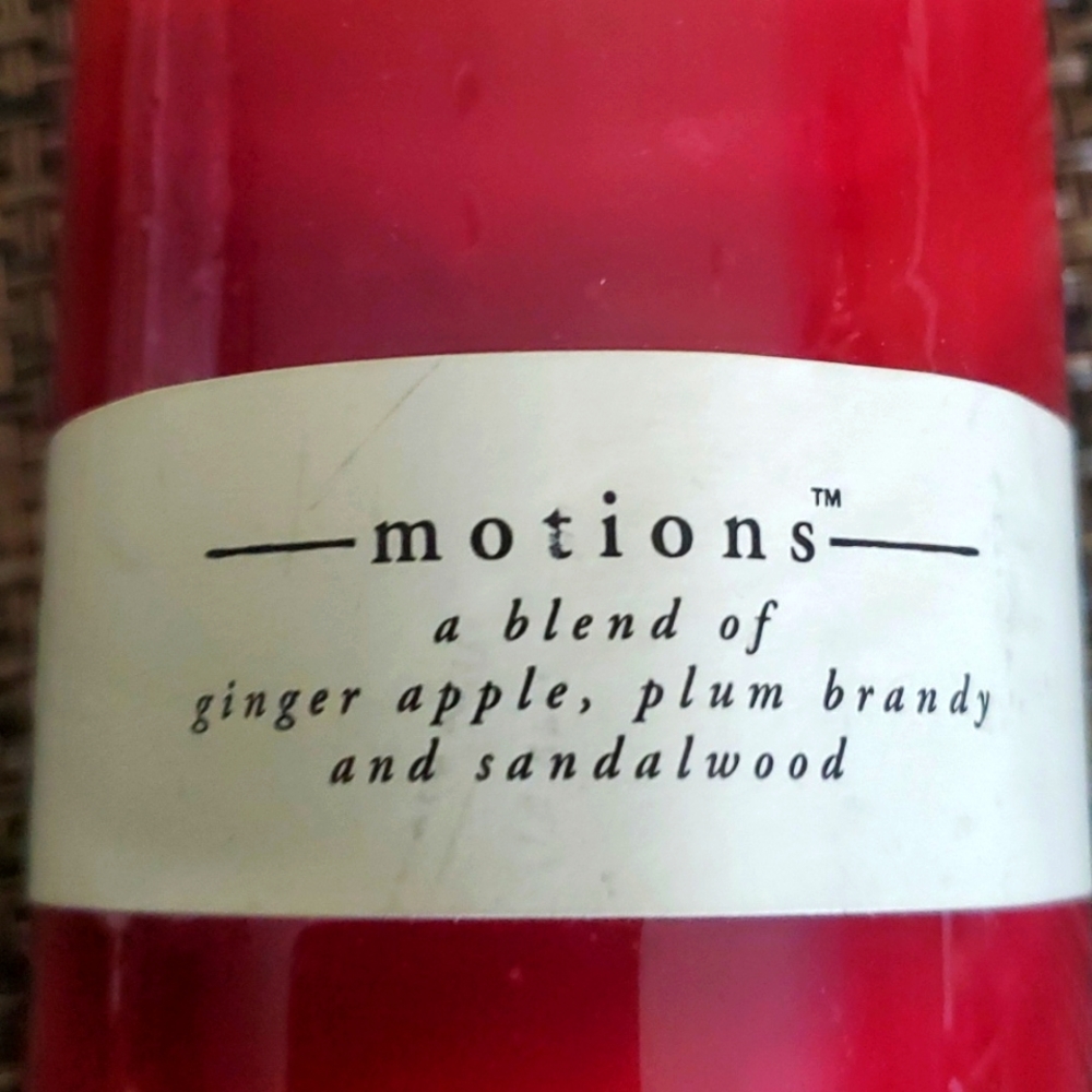 Pier 1 candle Motions Ginger Apple, plum brandy and sandalwood scent.  Brand new